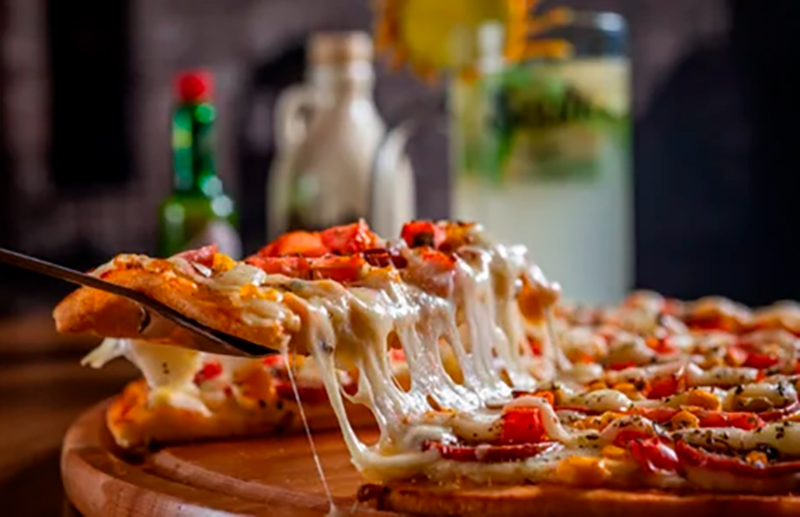 Fatia de pizza Scur com queijo derretido